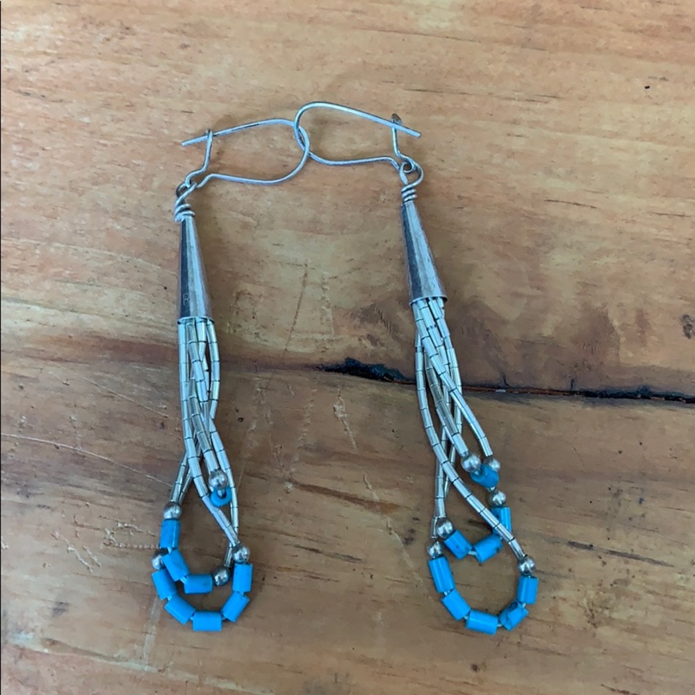 Silver and blue beaded statement earrings